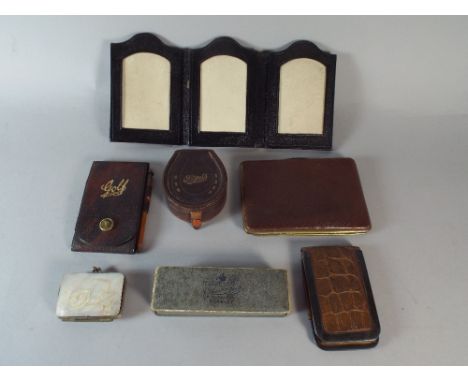 A Collection of Three Purses, Note Pads, Stud Box, Photo Frame and Travelling Comb. 
