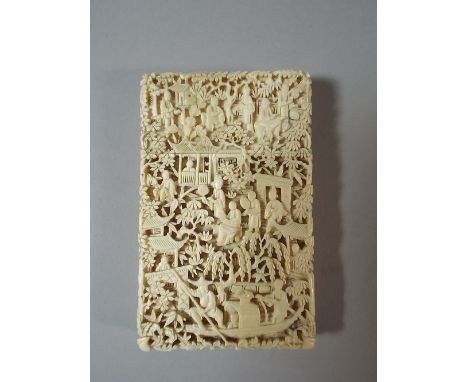 A Good Ornately Carved Cantonese Ivory Card Case Depicting Figures, Boats, Family Scenes and Pagodas Etc. 6.5 x 10.5 Cms. 