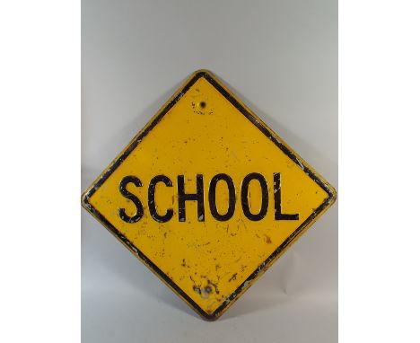 A Mid 20th Century American Road Sign with the Yellow and Black Enamel 'School' Warning. 60x60cm
