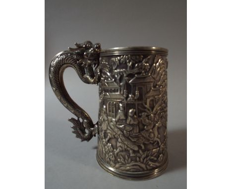 A Good Quality Chinese Silver Tankard with Carved Body Depicting Figures, Pagoda, Battle  Scenes Etc. Dragon Handle. Seal Mar