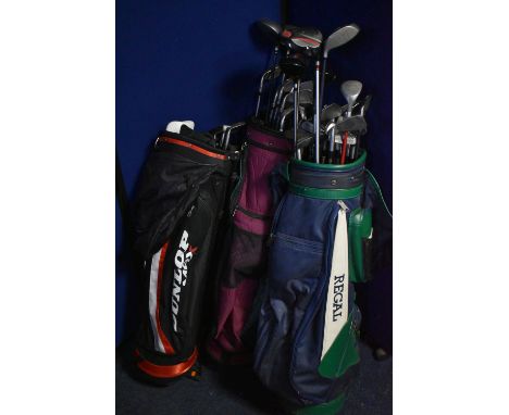 THREE GOLF BAGS, Dunlop, Regal and Hippo containing various golf clubs to include Hippo, Aldila, Wilson etc