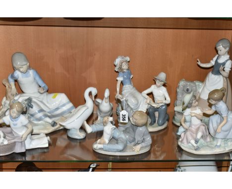A LARGE COLLECTION OF LLADRO NAO FIGURES, comprising a 'Seated girl with goat' (broken and reglued horn), 'It's time to sleep