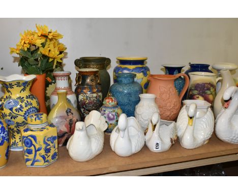 A COLLECTION OF CERAMIC VASES, to include largely modern pieces, some of an Oriental style, a small stone vase height 19.5cm,