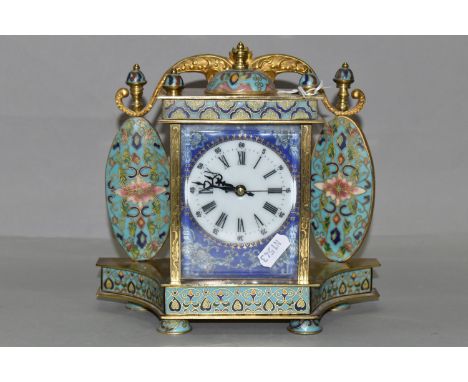 A MID 20TH CENTURY CHINESE CLOISONNE MANTEL CLOCK, the rectangular case with scrolled surmount, dome and finials, two oval cl