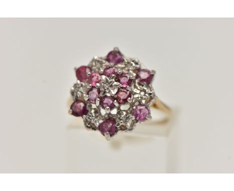 A 9CT GOLD RUBY AND DIAMOND CLUSTER RING, designed as a tiered cluster of single cut diamonds and circular rubies, 9ct hallma