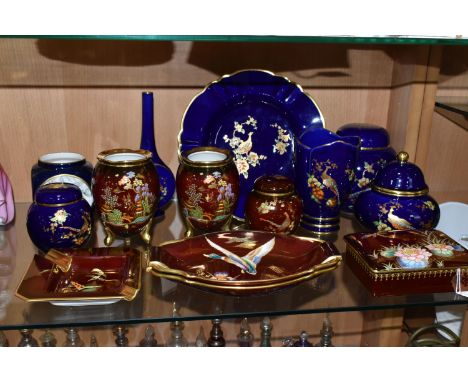 A COLLECTION OF CARLTON WARE, comprising six pieces of Peacock and Blossoms pattern including vases, tallest 18.5cm, plate an