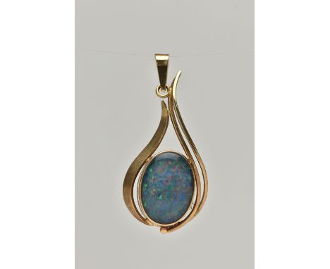 A GEM PENDANT, designed as an oval opal triplet in a collet setting with abstract pear shape surround, length 4.5cms, approxi