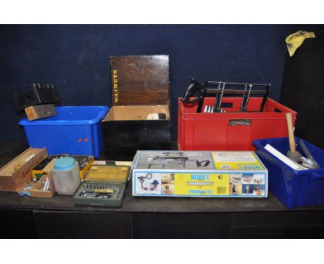 FOUR PLASTIC BOXES CONTAINING TOOLS including paint and pasting brushes, two mitre saws, a mitre block, a Proxxon Industrial 