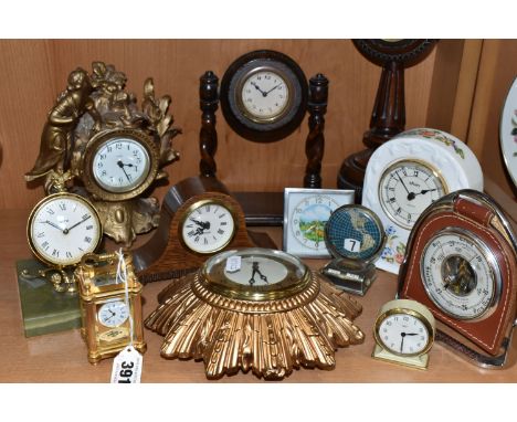 A COLLECTION OF SMALL CLOCKS, to include a miniature glass cased carriage clock with visible movement, height 9.5cm, a Smiths