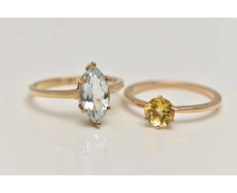 TWO 9CT GOLD GEM SET RINGS, the first claw set with a marquise shape aquamarine, ring size M 1/2, the second claw set with a 