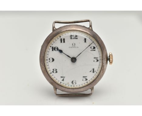 AN EARLY 20TH CENTURY SILVER 'OMEGA' WATCH HEAD, manual wind requires some attention, round white dial signed 'Omega', Arabic