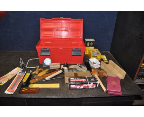 A PLASTIC TOOLBOX CONTAINING CARPENTRY TOOLS including a Woden X190 dowelling jig, a Record No0110 plane, a Marple’s mortice 