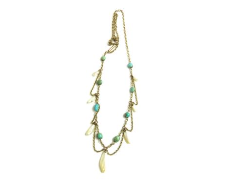 An Edwardian necklace set with turquoise and irregular shaped pearls or possibly mother of pearl pieces, the turquoise set at