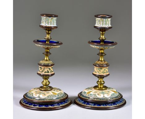 A Pair of Doulton Lambeth Stoneware and Brass Candlesticks, Circa 1880, of French inspiration, incised with leaf designs, imp