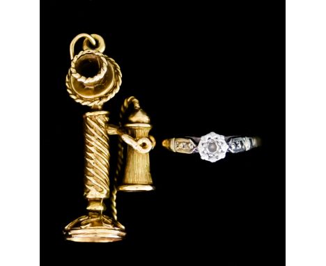 A Candle Stick Telephone Charm, and a 9ct gold ring set with small diamond, size L, total gross weight 7.1g Note: Metal unmar