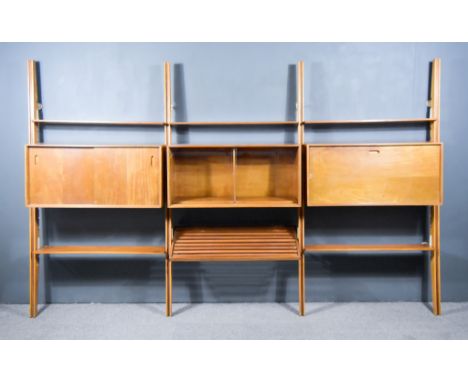 A 1960s Teak Three Section Wall Mounted Shelf Unit, with adjustable open shelves, cupboard enclosed by a pair of sliding door
