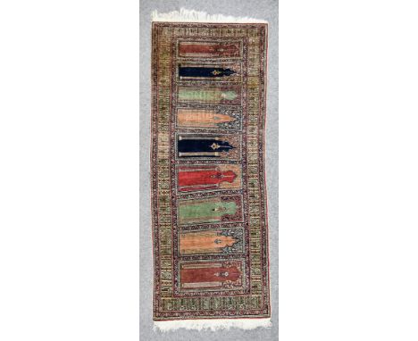 A 20th Century Bakhtiari Part-Silk Runner of Trellis Design, woven in colours of ivory, navy blue and wine, the field filled 