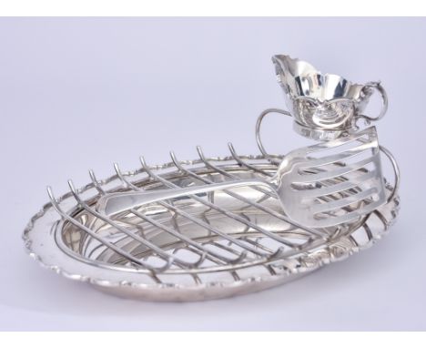 An Elizabeth II Silver Oval Asparagus Serving Set, by James Dixon & Sons, Sheffield 1958, comprising - oval dish with shaped 