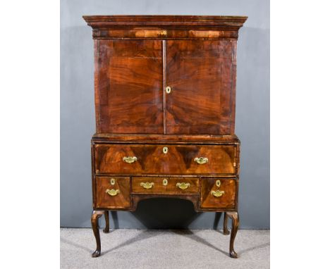 An 18th Century Walnut Cabinet on Stand, the upper part with moulded cornice, fitted one cushion fronted drawer, above cupboa