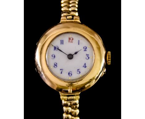 A Lady's 15ct Gold Manual Wind Wristwatch, 15ct gold case, 30mm diameter, with 15ct inscribed dust cover, white dial with blu