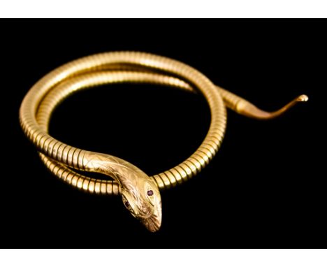 A 9ct Gold Articulated Bangle of Serpent Form, total gross weight 37gThe item presents in good overall condition showing wear