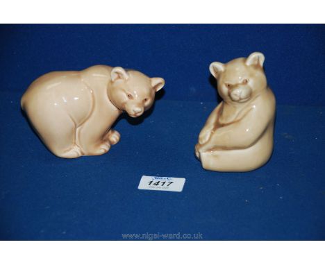 A pair of Poole Pottery brown bears.