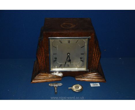 An Art Deco Westminster chiming mantle Clock by Sermon of Torquay, with square face and Roman numerals, with key, 12 1/2'' x 