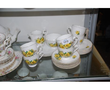 A Royal Grafton pretty part Teaset including six each of cups, saucers and tea plates, milk jug, sugar bowl and cake plate.