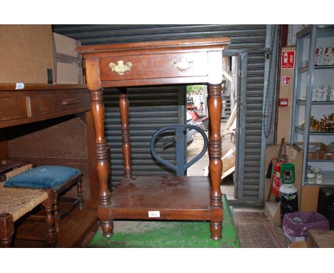 A Mahogany finished square occasional Table having a frieze drawer and lower shelf all supported on turned legs, 18 1/2'' x 1