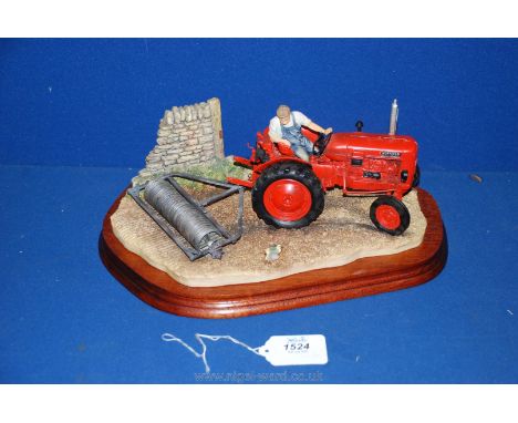 A Border Fine Arts 'Turning with Care', a Nuffield tractor with roller, limited edition no. 1361/1750 by R.J Ayres, with cert