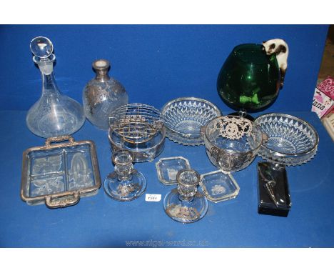 A box of mixed glass including a large green glass display bowl with cat, glass, decanter, glass table sets with white metal 