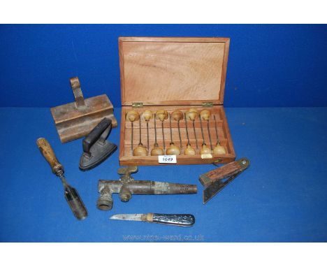 A small box of miscellanea including small flat iron, wood plane, penknives, barrel tap and box of craft tools.