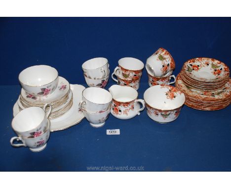 Two bone china part Teasets, one of Elizabethan pattern comprising six each of cups, saucers and tea plates, plus sugar bowl 