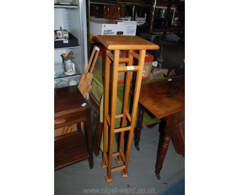 A light Oak Jardiniere stand/Lamp stand on square supports, 11'' x 11'' x 46 1/2'' high