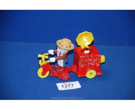 A Corgi Magic Roundabout Mr McHenry trike.