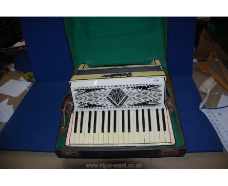 A cased accordion 'Geraldo Standard Italia'.
