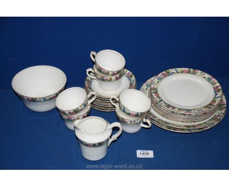 A Crown Willow Teaset, white ground with border of oriental scenes, consisting of six cups and saucers, six tea plates, milk 