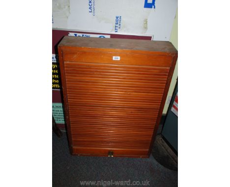 A highly collectable, honey coloured, mixed woods wall-hanging tambour-fronted Edmondson 96 rack Card Ticket Cabinet fitted i