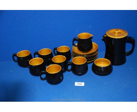 A Prinknash coffee set to include coffee pot (chip to spout), six coffee cans and six saucers.