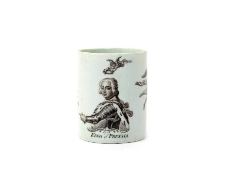 A Worcester King of Prussia mug dated 1757, printed in black with a titled portrait of Frederick II of Prussia pointing towar