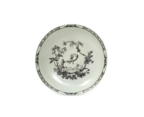 A Worcester saucer  c.1760, printed in black with Les Garçons Chinois, two chinoiserie figures clambering over rococo scrolls