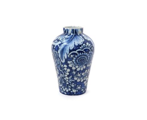 A rare Dublin or Liverpool delftware vase  c.1760, the ovoid form boldly painted in blue relief with large peony and chrysant