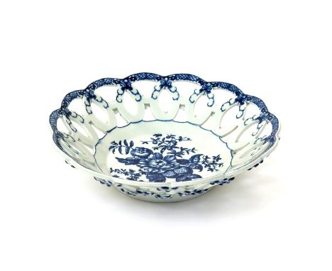 A large Worcester blue and white circular basket  c.1770-80, printed with the Pinecone pattern, the shallow sloping sides for