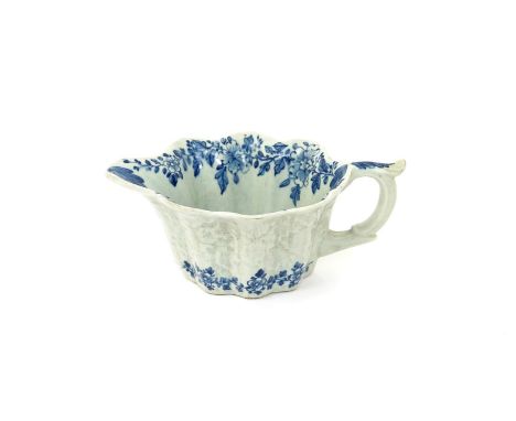 A rare Limehouse blue and white moulded sauceboat  c.1746-48, moulded to the exterior with bands of overlapping leaves, paint
