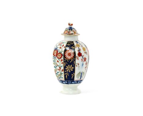A Worcester tea canister and cover c.1768-70, of Warmstry fluted form, painted with a Japan pattern with panels of kakiemon f