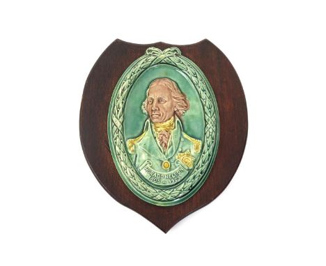 A Doulton Lambeth commemorative plaque for the 1905 centenary of the death of Nelson, modelled in high relief with a head and