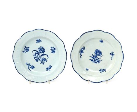 Two Worcester blue and white plates  c.1770-80, one printed with the central design of the Carnation and Fruit Sprigs pattern