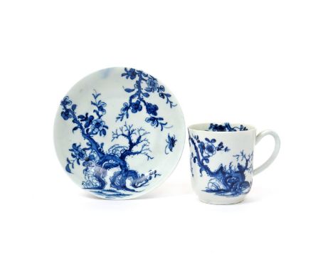 A Worcester blue and white coffee cup and saucer  c.1758, the cup of generous U-shaped form, painted with the Prunus Root pat