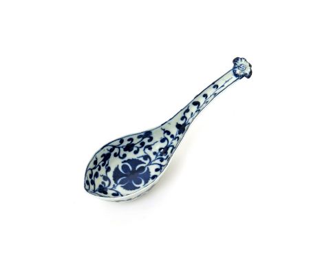 A Worcester blue and white rice spoon  c.1770, painted with the Maltese Cross Flower pattern,the sloping sides of the bowl wi