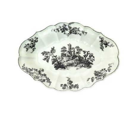 A Worcester fluted dish  c.1770, printed in black with a courting couple seated before Classical ruins overlooking sailing bo